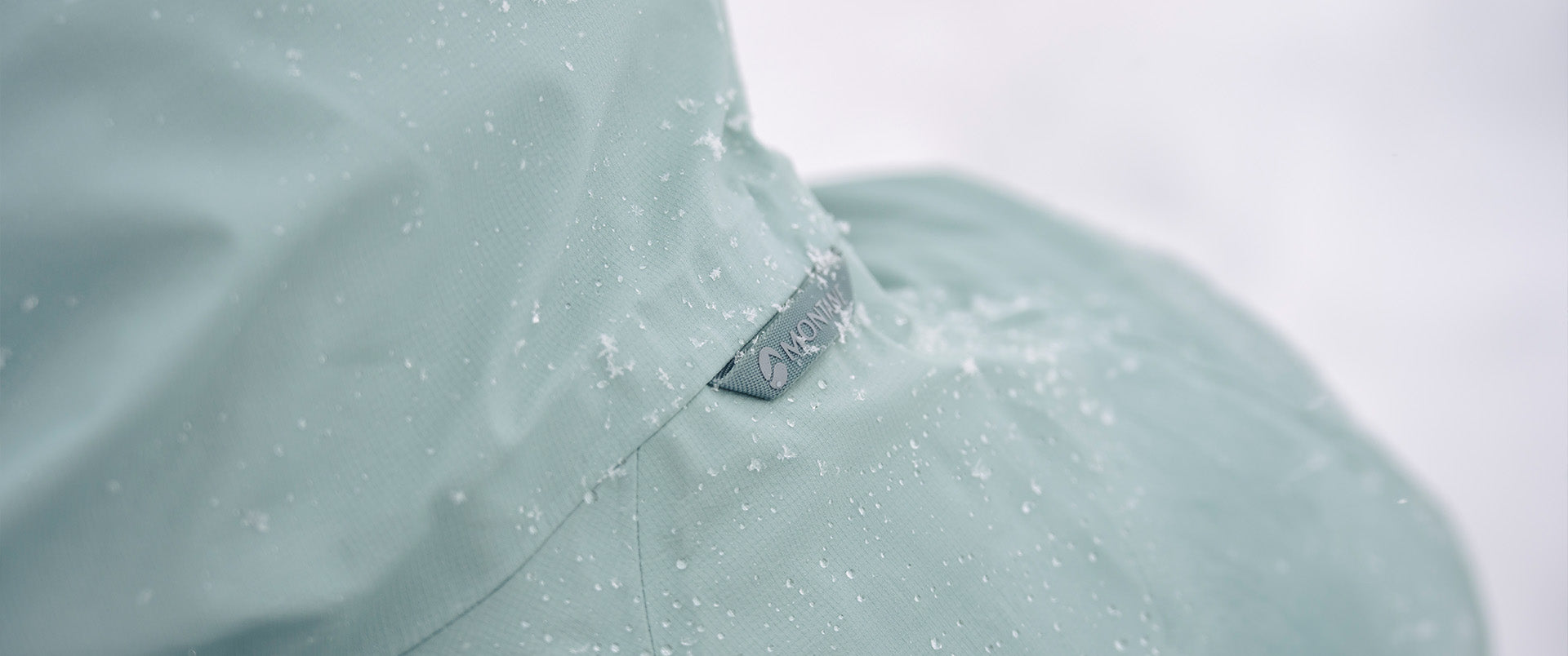 Close up of Montane Cetus Lite Waterproof Jacket in Sea Mist - Landscape